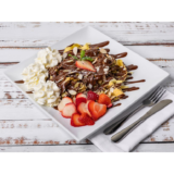 Two crepes sliced into thin ribbons, drizzled Chocolate Sauce, topped with crunchy almonds and whipped cream. exciting? Desserts Delivery Orange County