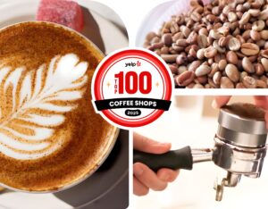 Yelp America Top 100 Coffee Shop. Latte Cup with art, coffee beans, a Hand pulling Espresso shot